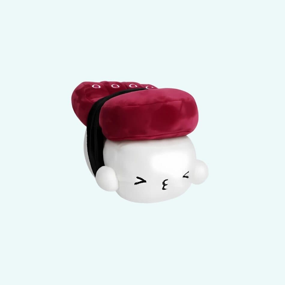 Sushi plush toys, including nigiri, maki rolls & temaki, displayed in a cozy, modern home setting. Kawaii food plushies & gifts.