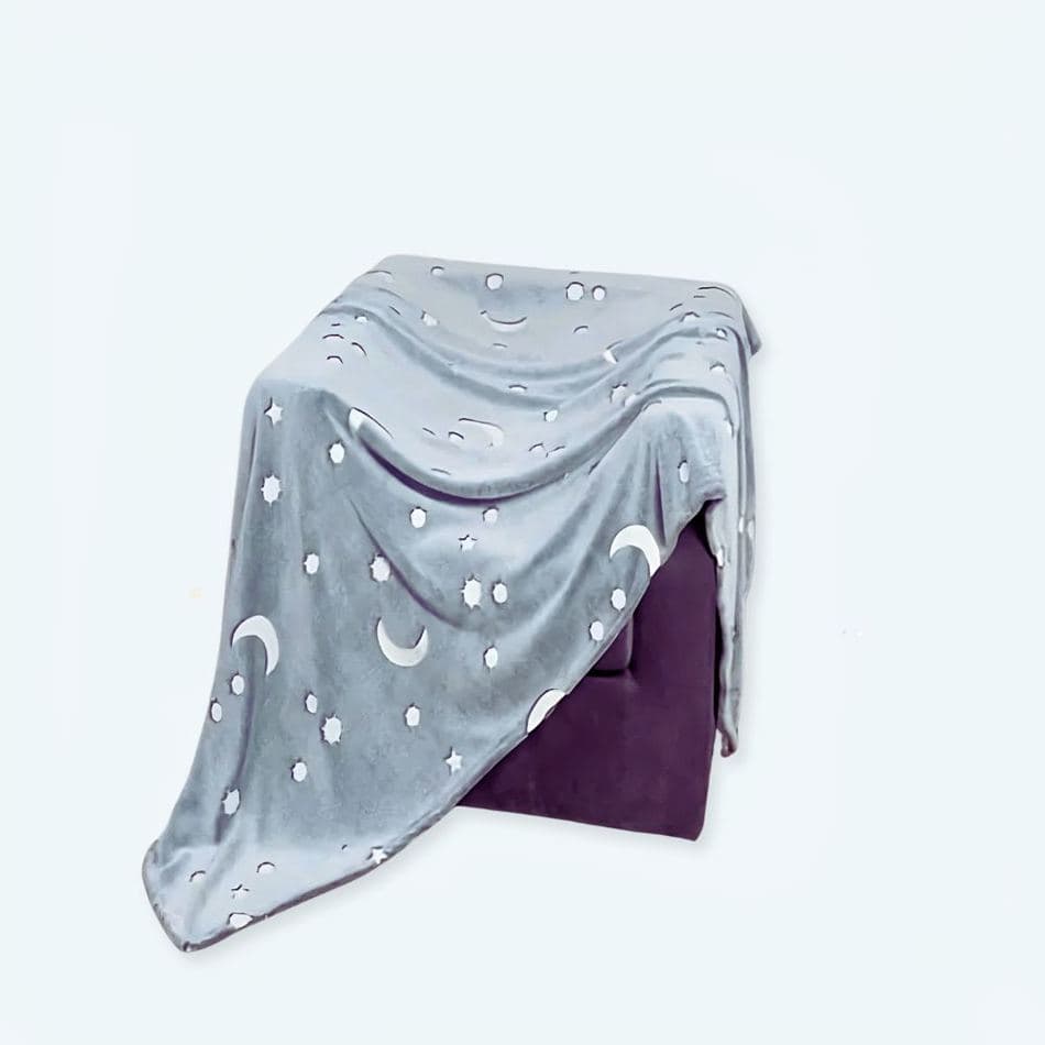 Neon throws, glow-in-the-dark blankets, LED throws, throws for night, outdoor throws, light-up decor, urban setting, cozy night.